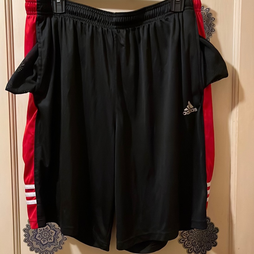 Gently loved men black and red Adidas athletic shorts. Size XL smoke free
